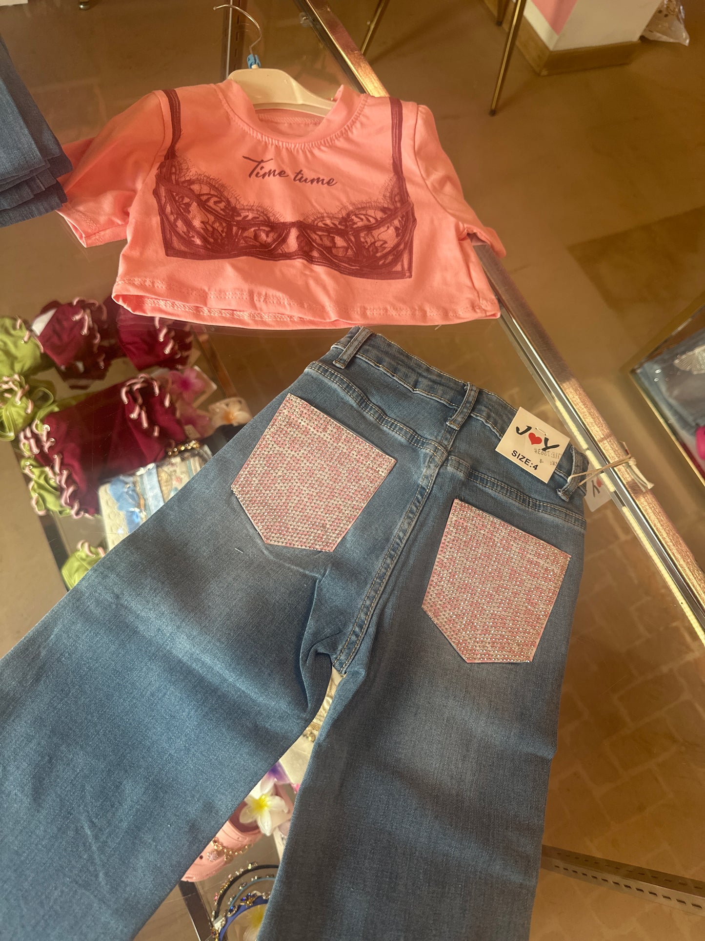 Jeans tasca rosa