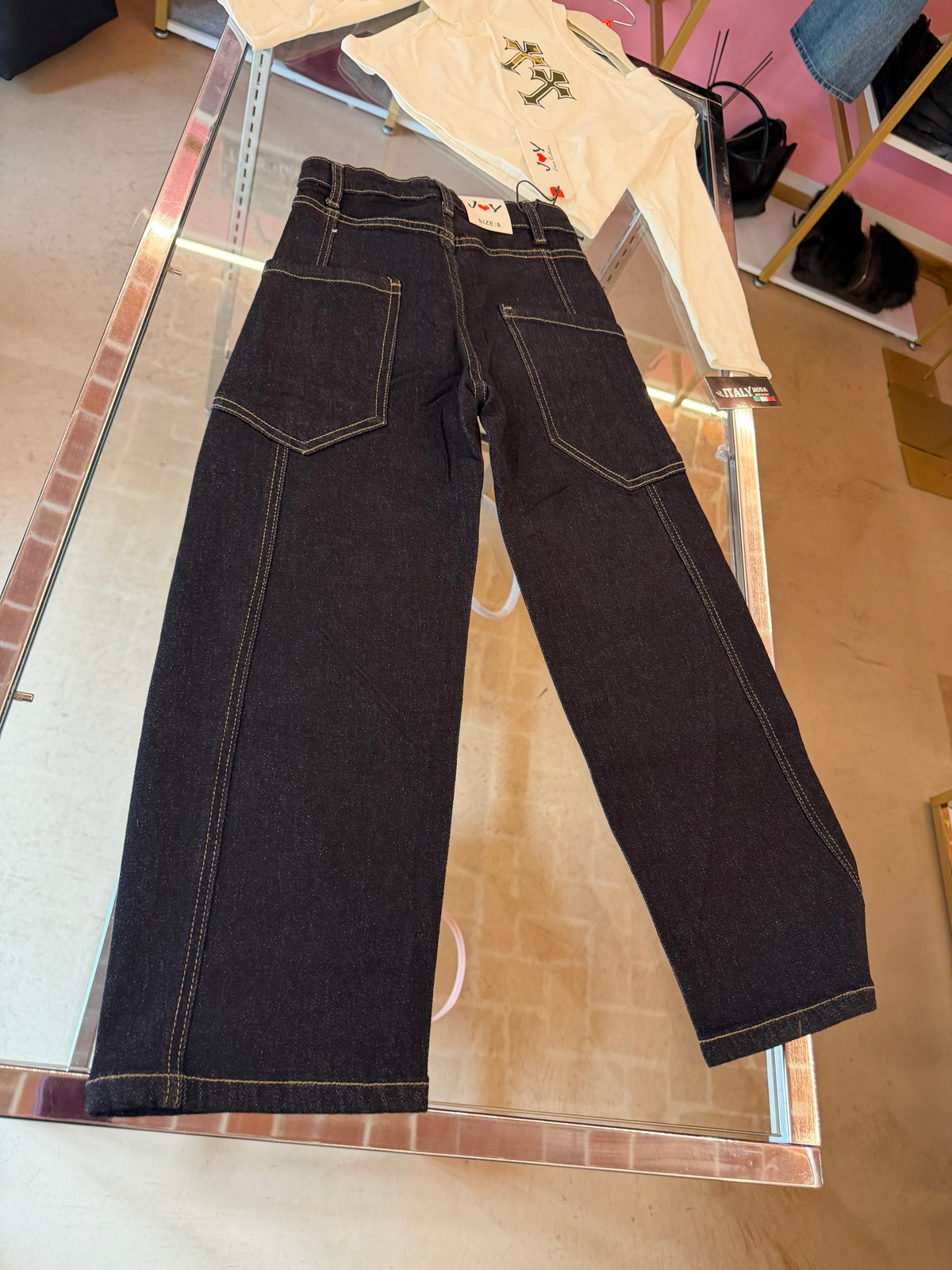 Jeans, croci colorate