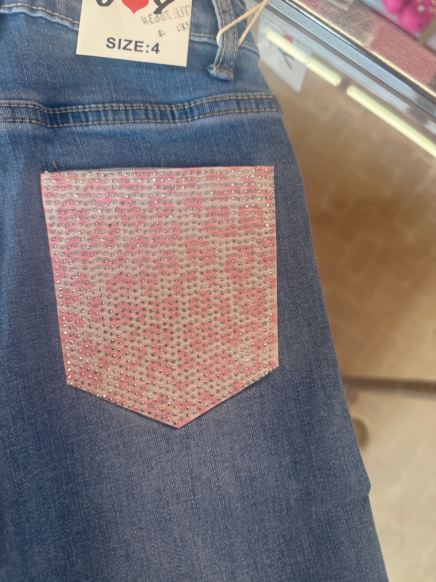 Jeans tasca rosa