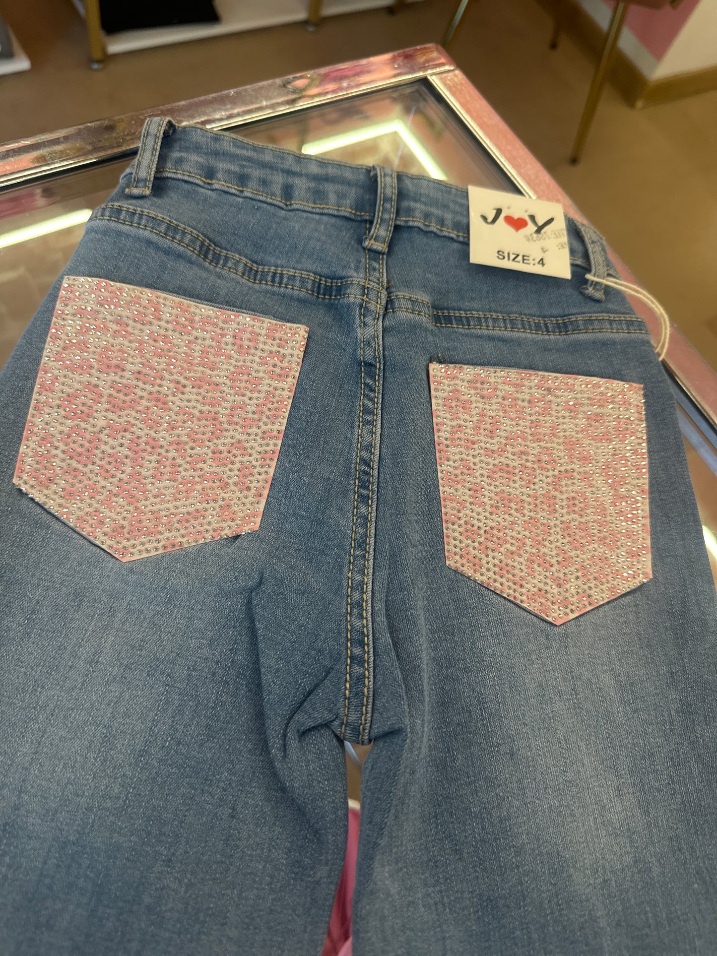 Jeans tasca rosa