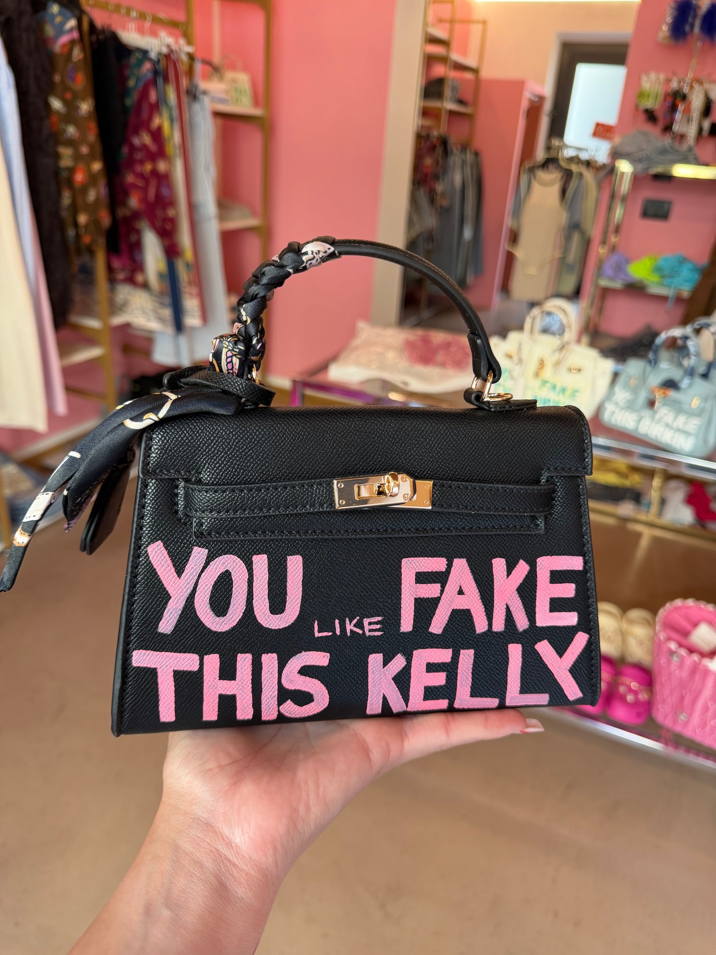 Mini kelly scritta rosa